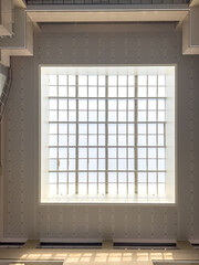 A square window in the hallway