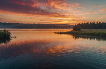 Fototapeta na wymiar sunset over lake landscape background