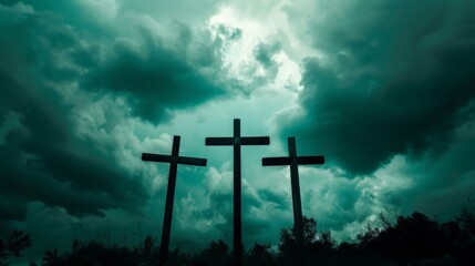 a cloudy sky surrounding three crosses