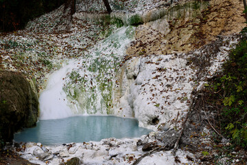 Bagni San Filippo is a small hot spring containing calcium carbonate deposits, which form white concretions and waterfalls. The grotto is open to visitors. Castiglione D'orcia SI, Tuscany, Italy