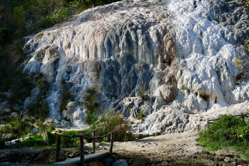 Bagni San Filippo is a small hot spring containing calcium carbonate deposits, which form white concretions and waterfalls. The grotto is open to visitors. Castiglione D'orcia SI, Tuscany, Italy