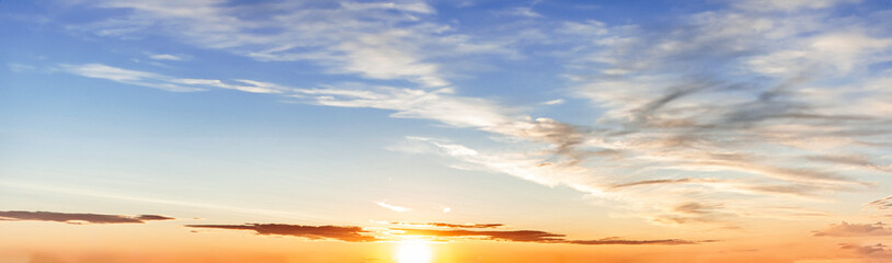 Fototapeta na wymiar Beautiful sunset sky above clouds with dramatic light. Sunset Sky, Beautiful nature.