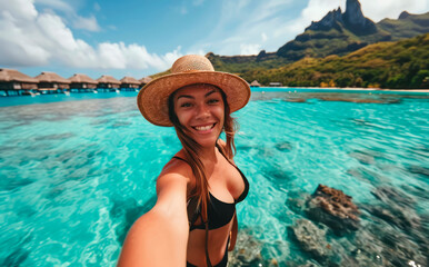 Bora Bora Bliss: A Young Native Woman, Radiating Joy, Captures a Tropical Selfie in a Bikini Paradise Overlooking the Azure Waters of Bora Bora