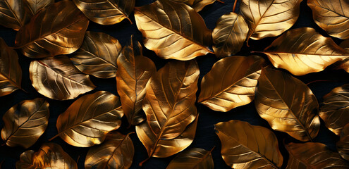 golden leaves on a black background