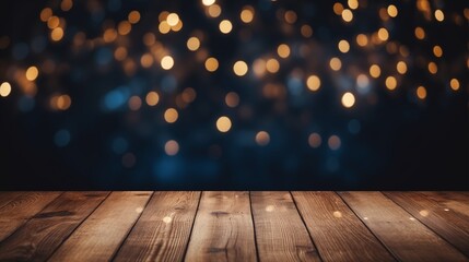 empty wooden table with golden bokeh and dark blue blurred background 