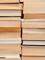 Background in the form of stacks of books. Day of book, knowledge, writer.