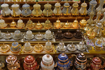 Colorful souvenirs from traditional Turkish jugs on the counter