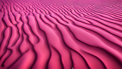 Texture formed on the magenta sand dunes which creates abstract shapes and forms