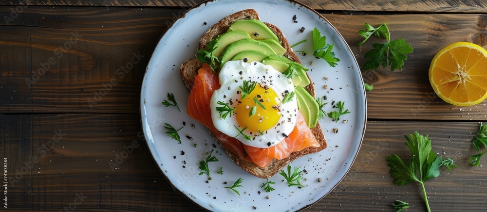 Aufkleber Toast with salmon poached egg and avocado on a white plate Poached egg with salmon and guacamole on rye bread. with copy space image. Place for adding text or design