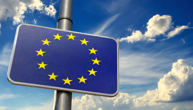 Closeup of a modern road sign with the European Union Flag on blue sky with clouds and copy space. Generative Ai.