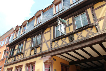 half-timbered house (preiss-zimmer) in a village (riquewihr) in alsace in france