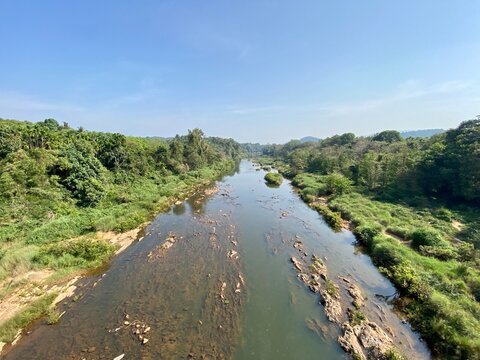 A river flowing through the thick forests of the Western Ghats around the village of Sakleshpur in Karnataka in South India.