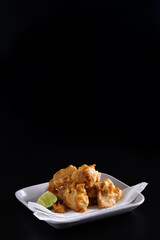 Chicken Karaage Japanese Fried chicken isolated in black background