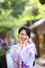 portrait woman with yukata dress in the garden