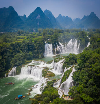 Aerial view of Detian Transnational Waterfalls along the river at Moon Hill Yangshuo valley, Chongzuo City, Yangshuo County, Guilin, Guangxi Zhuang Autonomous Region, China.