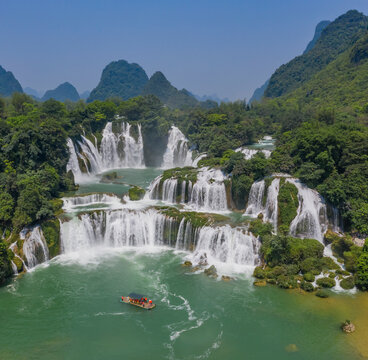 Aerial view of Detian Transnational Waterfalls along the river at Moon Hill Yangshuo valley, Chongzuo City, Yangshuo County, Guilin, Guangxi Zhuang Autonomous Region, China.