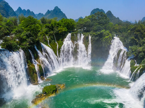 Aerial view of Detian Transnational Waterfalls along the river at Moon Hill Yangshuo valley, Chongzuo City, Yangshuo County, Guilin, Guangxi Zhuang Autonomous Region, China.