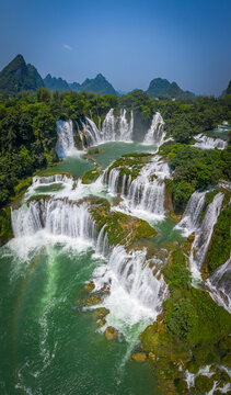 Aerial view of Detian Transnational Waterfalls along the river at Moon Hill Yangshuo valley, Chongzuo City, Yangshuo County, Guilin, Guangxi Zhuang Autonomous Region, China.