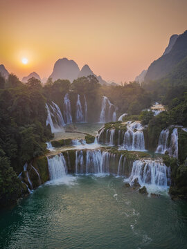 Aerial view of Detian Transnational Waterfalls along the river at Moon Hill Yangshuo valley, Chongzuo City, Yangshuo County, Guilin, Guangxi Zhuang Autonomous Region, China.