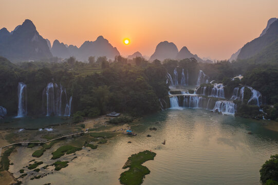 Aerial view of Detian Transnational Waterfalls along the river at Moon Hill Yangshuo valley, Chongzuo City, Yangshuo County, Guilin, Guangxi Zhuang Autonomous Region, China.