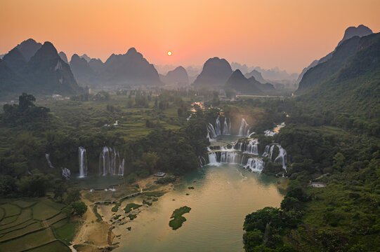 Aerial view of Detian Transnational Waterfalls along the river at Moon Hill Yangshuo valley, Chongzuo City, Yangshuo County, Guilin, Guangxi Zhuang Autonomous Region, China.