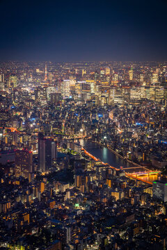 Aerial view of Tokyo skyline at sunset along the Sumida river, Japan.
