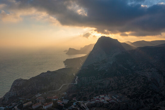 Aerial view of mountains along the Black Sea coastline at sunset, Crimea Region, Autonomous Republic of Crimea, Ukraine.