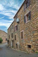 Piana village in Corsica, old houses, in a typical street
