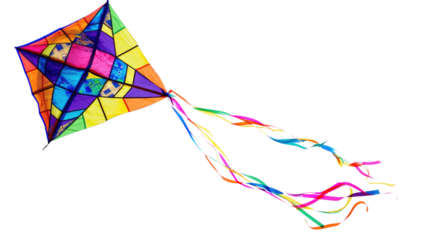 Colorful patchwork kite with long ribbons flying