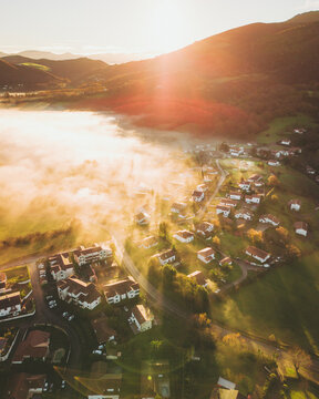 Aerial shot of Ascain at sunrise with mist, French Basque Country, Pyr&eacute;n&eacute;es-Atlantiques, Nouvelle-Aquitaine, France.