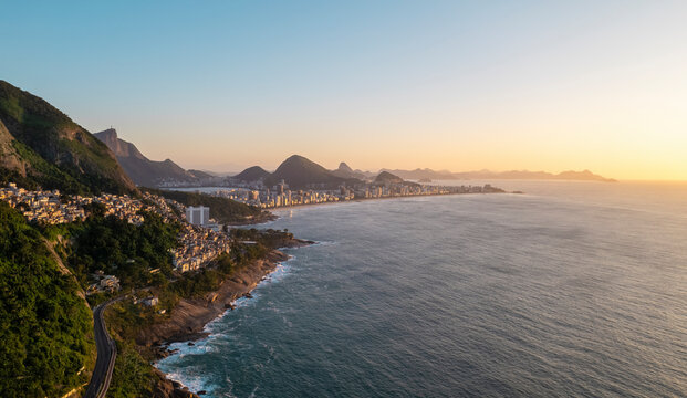 Aerial drone view of the city of Rio De Janeiro with the sunrise, Rio de Janeiro, Brazil.