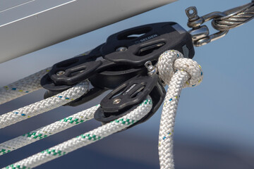 Pulley with ropes of a sailboat for a good working sail equipment of the boat