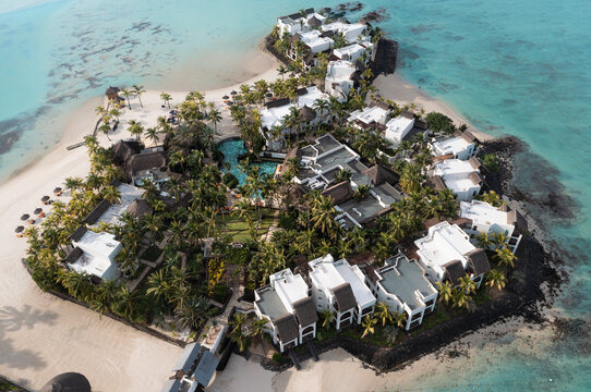 Aerial drone view of 5 star resort Shangri - La Le Touessrok with sandy beach, white villas and pool, Ilot Lievres, Flacq, , Mauritius.