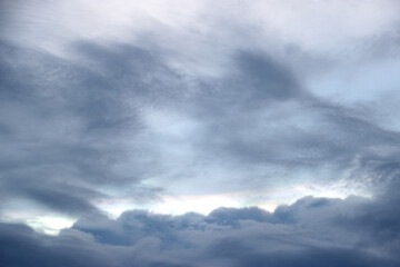 Fototapeta na wymiar dark blue storm cloudy with white light sky background and city light twilight night evening time