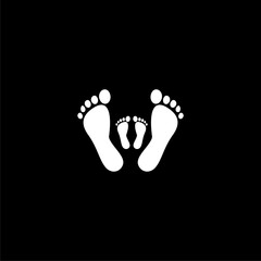 Human footprint. Family icon on black background 