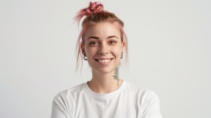young woman with a cheerful smile, sporting a trendy top bun with pink hair, a nose ring, and visible tattoos, embodying a modern and joyful aesthetic. - obrazy, fototapety, plakaty