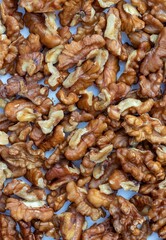 Top View of Walnut Dry Fruit Background with Copy Space in Vertical Orientation