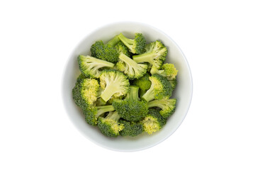 Sliced broccoli in white bowl isolated on white background with clipping path,edible green plant in...