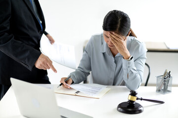 A legal officer is suffering from a headache as his boss scolds him - obrazy, fototapety, plakaty