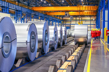 Rolls of sheet steel in selective focus. Cold rolled and hot rolled steel products for...
