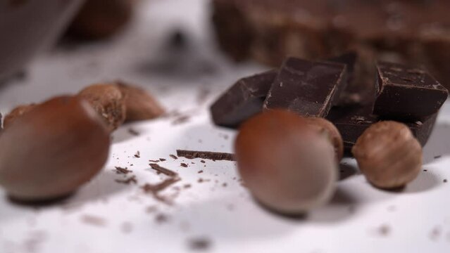 Chocolate and hazelnuts on a table. Delicious food. Dessert ideas.