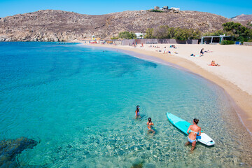 Mikonos, Greece: Agrari Beach with blue sea, wild and quiet, famous for diving, snorkeling and...