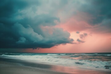 Fototapeta na wymiar Sunset beach with storm cloud. Light pink and dark aquamarine, subtle coloring, pink and indigo