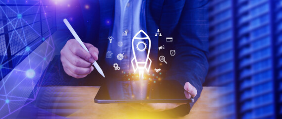 Startup business concept, rocket launching and flying from hand to sky for growing business, fast...