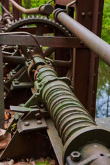 Rusted Industrial Screw Shaft and Gears in Nature