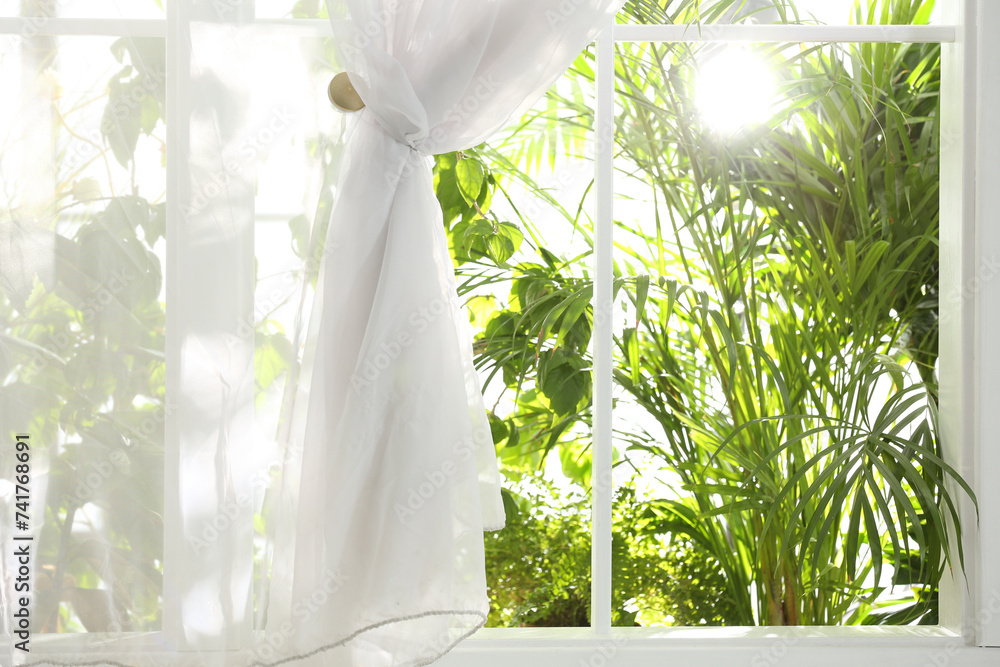 Canvas Prints Beautiful view through window on garden in morning