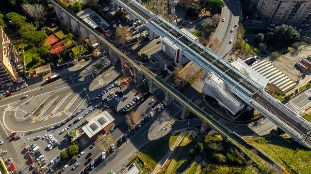 Aerial view of the Roman aqueduct crossing the Via Aurelia in Rome, Italy.