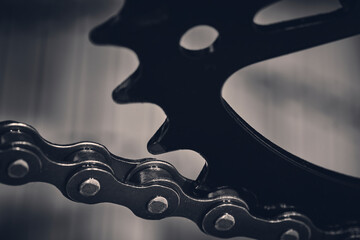 Bicycle chain is mounted on a bicycle star. - obrazy, fototapety, plakaty