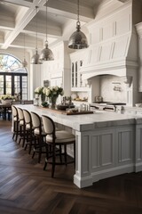 Fototapeta na wymiar White kitchen with large marble island and wood herringbone floor