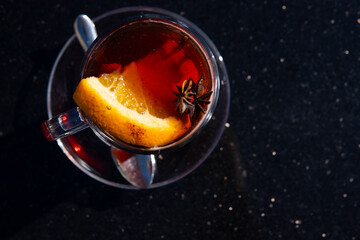 Winter fruit tea with orange, cloves and cinnamon